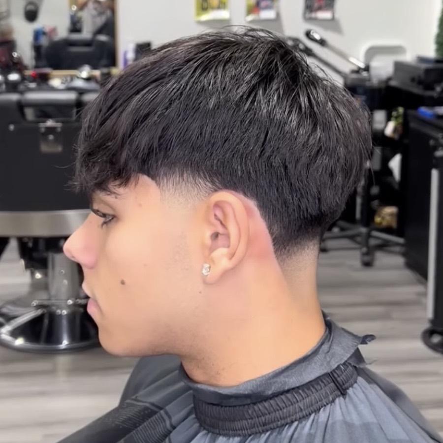 Textured crop with a low taper fade