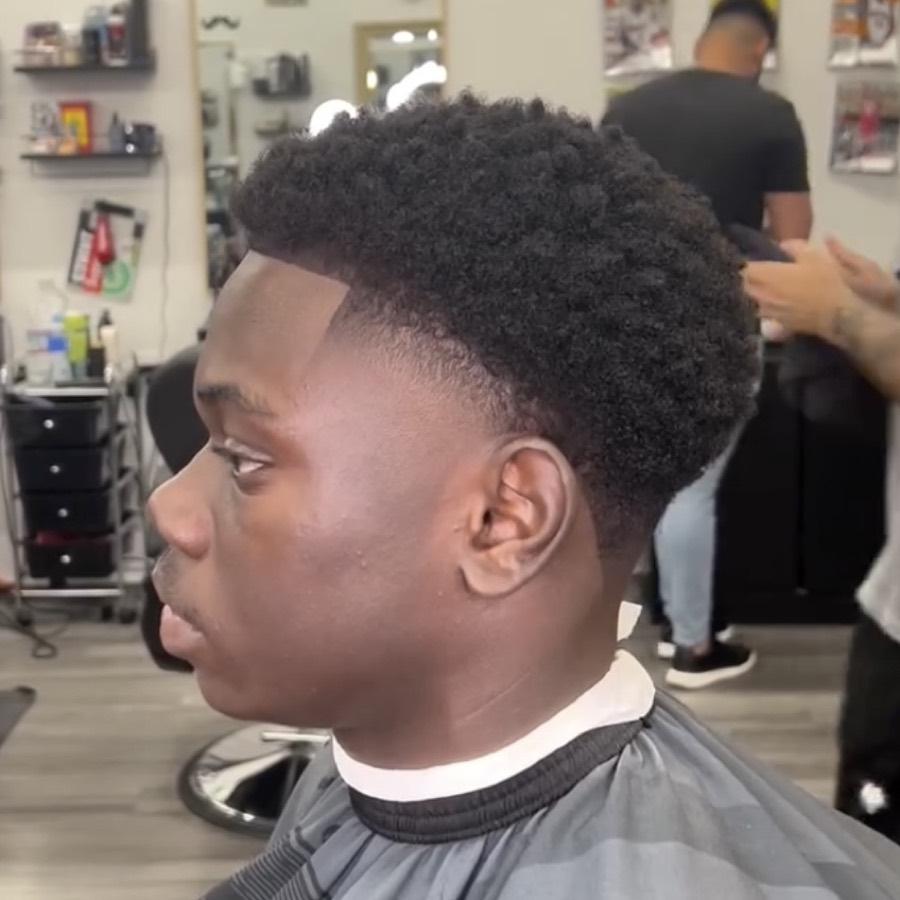 Afro with a box lineup and taper