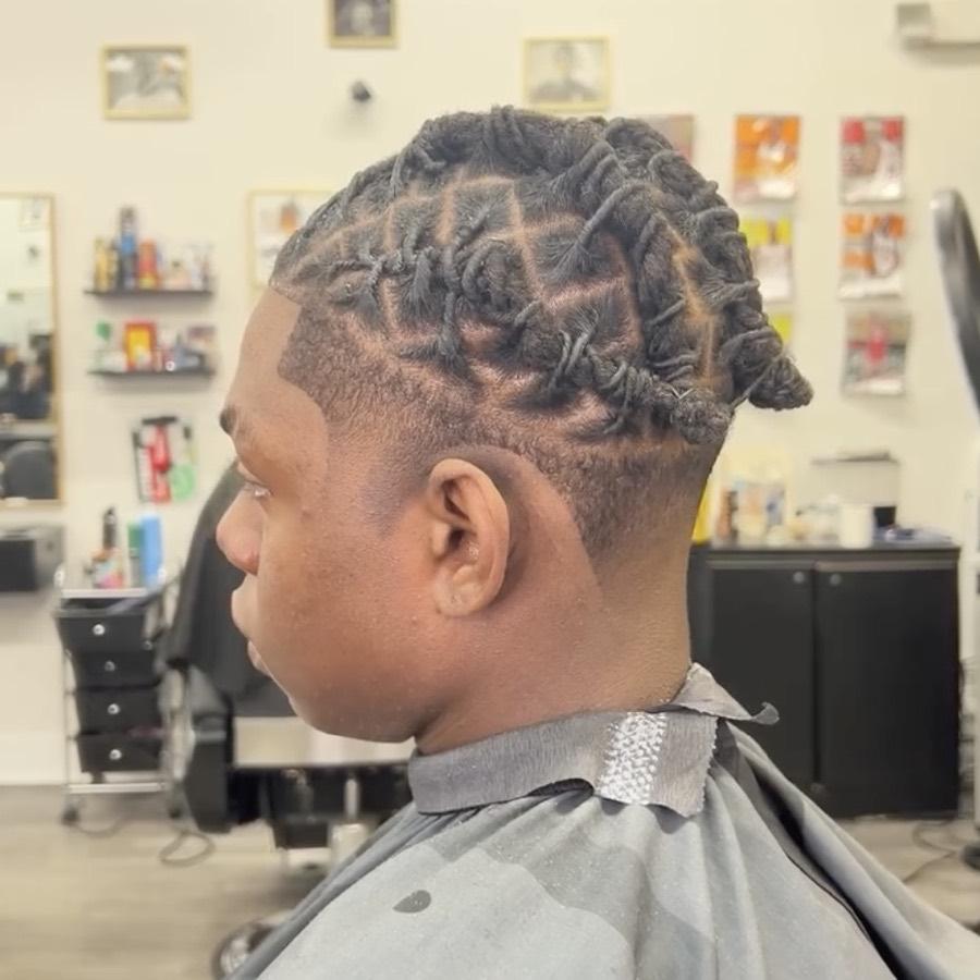 Twisted locs with a taper fade